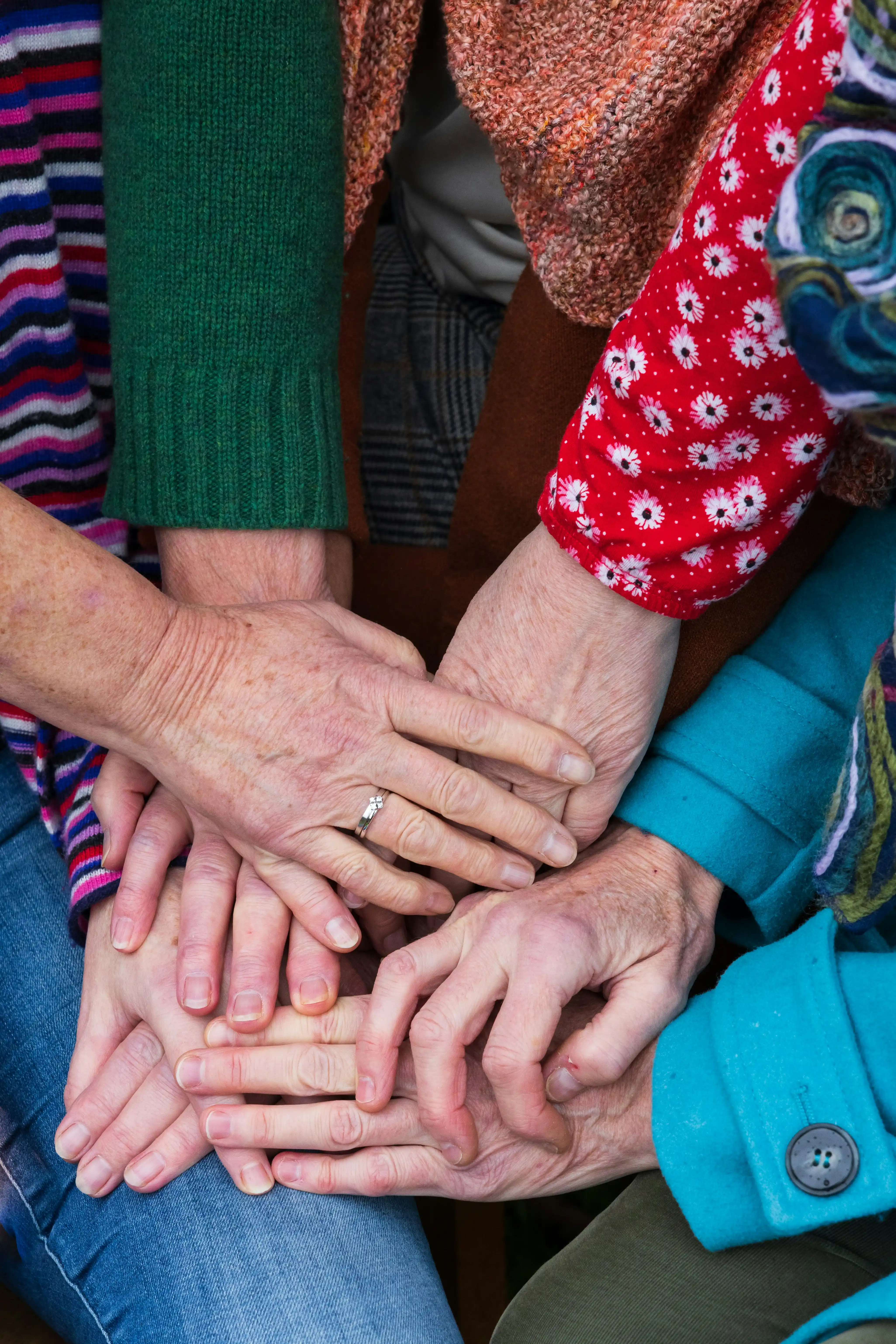 community hand holding community hand holding